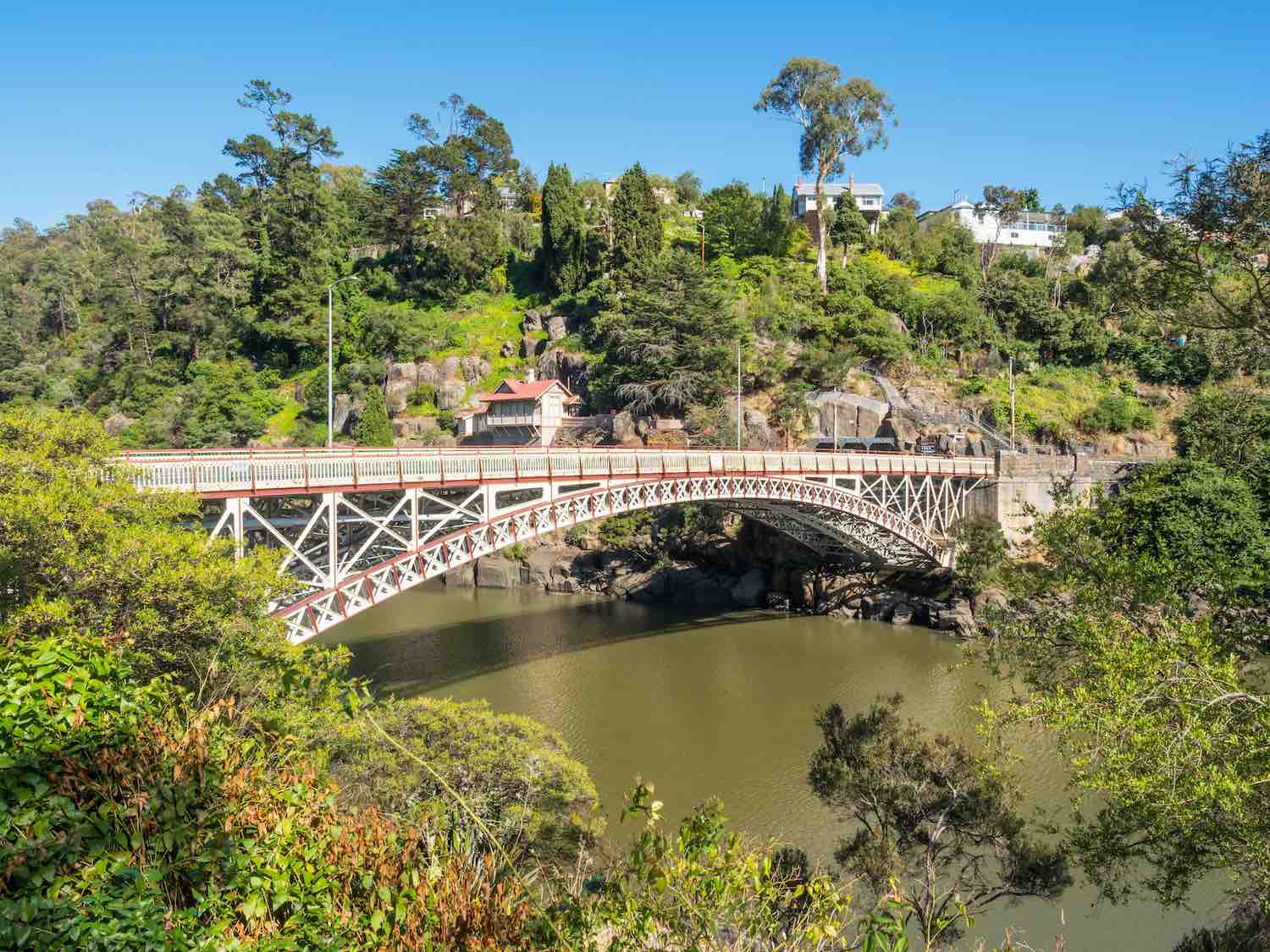 Kings Bridge, Launceston, spanning the junction of South Esk River and the River Tamar. The bridge is an unofficial border for the spectacular Cataract Gorge.