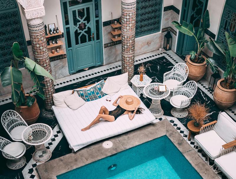 A poolside sunbather in a riad in Morocco.